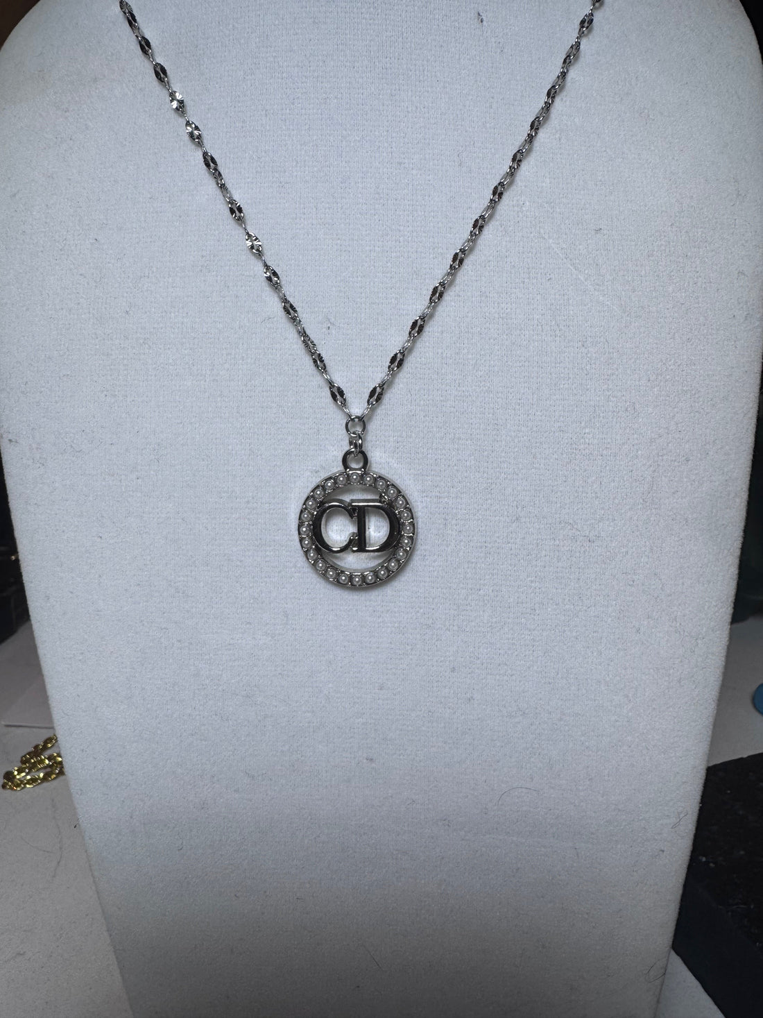 Reworked and one of a kind. Pearls framing a classic silhouette. Beadnikrow/Barmade